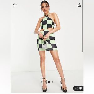 ASOS DESIGN halter cut out mini dress in green and black checkerboard. Size 6.